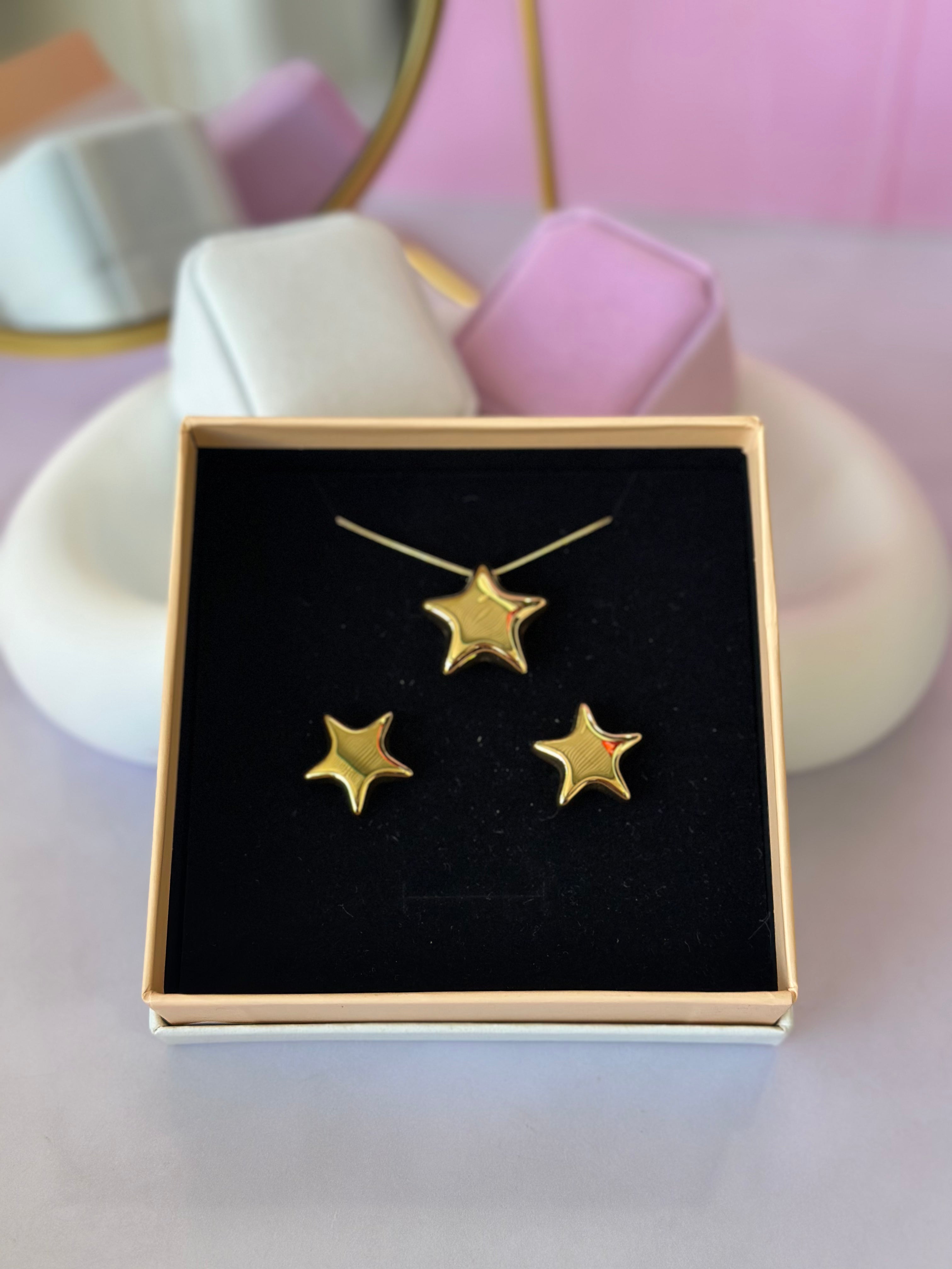 JUEGO DE ARETES Y COLLAR DE ESTRELLA ACERO 316