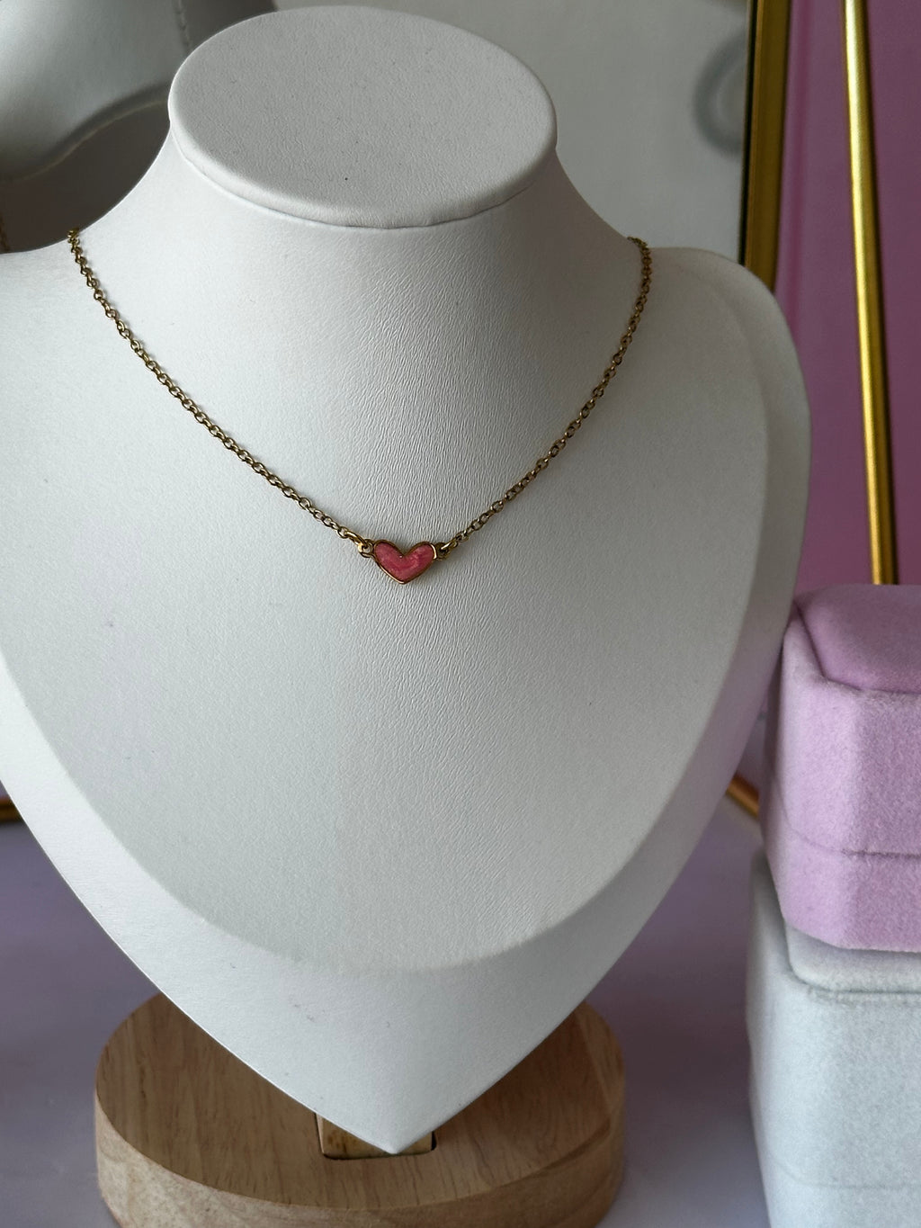 COLLAR CON DIGE EN FORMA DE CORAZÓN ROSADO ACERO 316