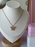 COLLAR CON DIGE DE MARIPOSA ROSA ACERO 316