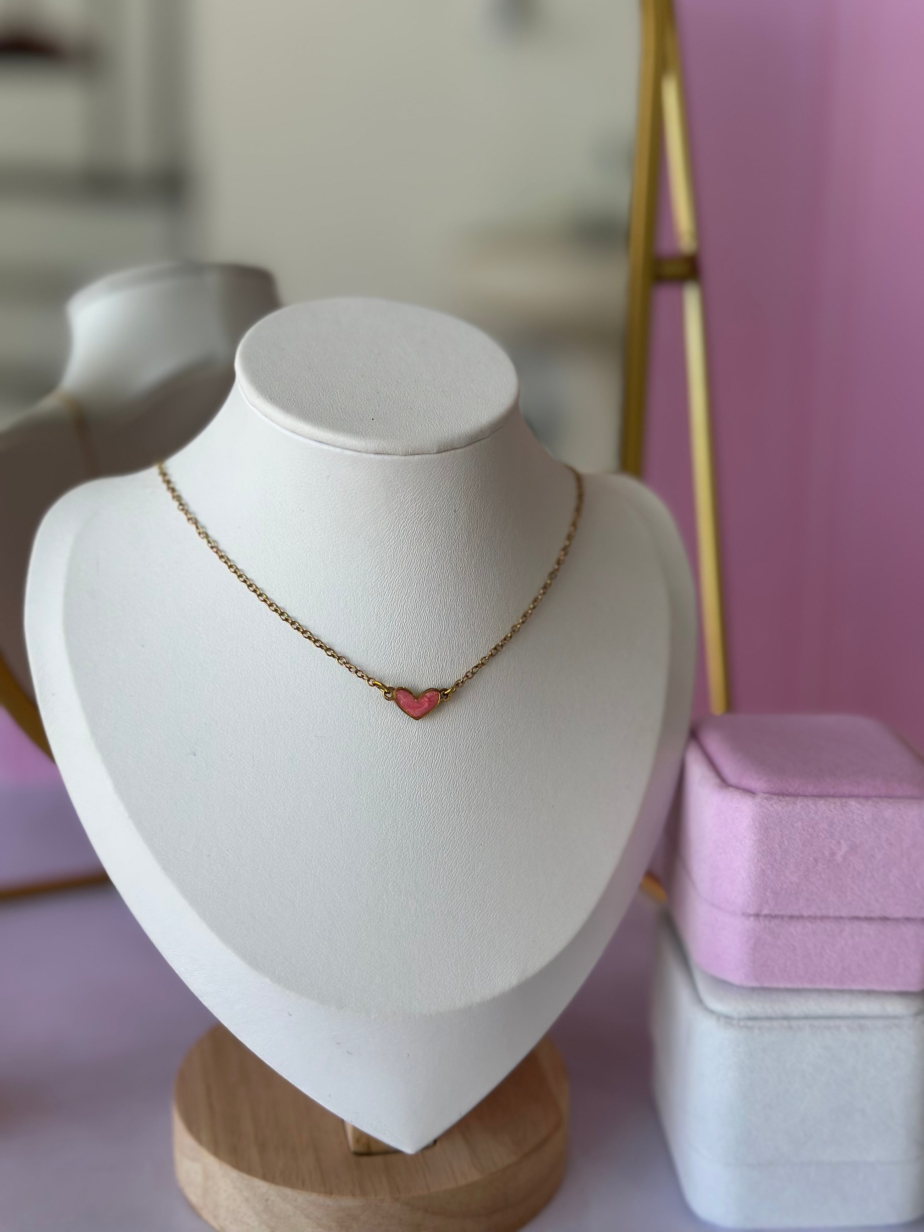 COLLAR CON DIGE EN FORMA DE CORAZÓN ROSADO ACERO 316